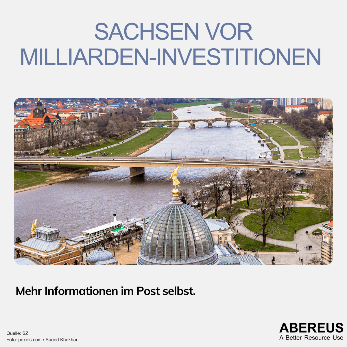 Auf dem Bild ist die sächsische Landeshauptstadt Dresden zu erkennen. Die Elbe mit zwei Brücken fließt durch die Mitte des Bildes und man erkennt verschiedene Wahrzeichen der Stadt